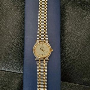 Vintage two tone Gucci watch.